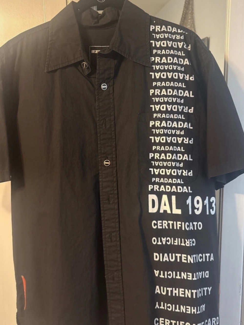 Prada Black Short-Sleeve Button-Down Shirt with White Graphic Text